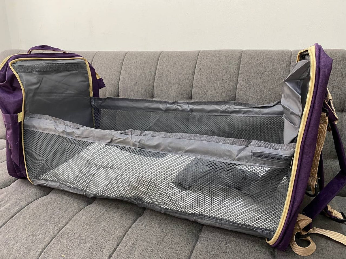 Pañalera-morral con cambiador tipo cuna y bolsillos térmicos