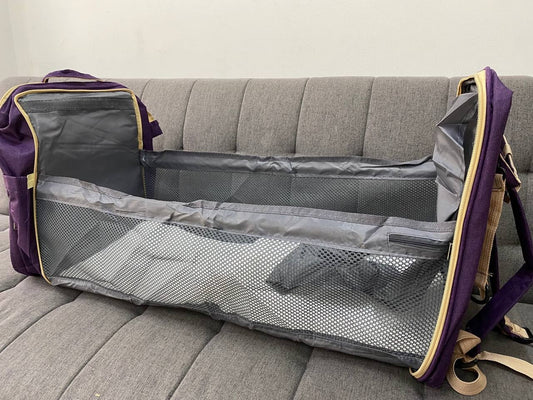 Pañalera-morral con cambiador tipo cuna y bolsillos térmicos