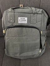 Pañalera-morral con cambiador tipo cuna y bolsillos térmicos
