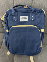 Pañalera-morral con cambiador tipo cuna y bolsillos térmicos